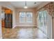 Eat-in kitchen area with stainless steel appliances, tile flooring, and sliding glass doors to the outside at 9684 Pebble Creek Blvd, Summerville, SC 29485