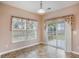 Bright dining area with tile floors and sliding glass doors providing access to outdoor patio at 9684 Pebble Creek Blvd, Summerville, SC 29485