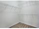 Bright walk-in closet with multiple wire shelves for optimal storage and organization at 9684 Pebble Creek Blvd, Summerville, SC 29485