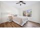 Comfortable bedroom with hardwood floors, ceiling fan and a window that provides plenty of natural light at 102 Kapalua Run, Summerville, SC 29483