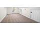 Spacious bonus room with neutral carpet and a window for natural light at 102 Kapalua Run, Summerville, SC 29483