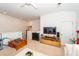 Bright living room features a comfortable white sofa, ceiling fan, and entertainment center at 1021 Barfield St, Charleston, SC 29492