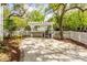 Outdoor kitchen area featuring a white pergola and built-in grill space for entertaining at 1021 Barfield St, Charleston, SC 29492