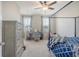 Bedroom featuring a four-poster bed, a desk and a dresser at 106 Wood Sage Run, Summerville, SC 29485