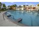 Community pool with convenient step access and nearby seating at 106 Wood Sage Run, Summerville, SC 29485
