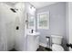 Updated bathroom featuring a tiled shower, vanity sink, and modern toilet at 117 Wernham Ln, Moncks Corner, SC 29461