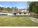 Exterior elevation of home with welcoming front porch and spacious front yard at 117 Wernham Ln, Moncks Corner, SC 29461