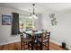 The dining room features hardwood floors, natural light, and decorative light fixture at 125 Mansfield Blvd, North Charleston, SC 29418