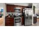 Kitchen with wood cabinets, stainless steel appliances and granite counters at 125 Mansfield Blvd, North Charleston, SC 29418