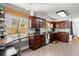 Spacious kitchen features wood cabinets, granite countertops, and stainless steel appliances at 125 Mansfield Blvd, North Charleston, SC 29418