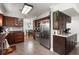 Open kitchen featuring wood cabinets, stainless steel appliances, and tile flooring at 125 Mansfield Blvd, North Charleston, SC 29418
