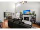 Bright and airy living room featuring a fireplace, soaring ceilings, and an open concept layout perfect for entertaining at 125 Mansfield Blvd, North Charleston, SC 29418
