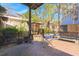 Covered patio with brick flooring and comfortable furniture, offering a cozy outdoor space at 125 Mansfield Blvd, North Charleston, SC 29418