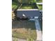 A high angle view of a brick house showing the roof and the backyard at 132 Heather Dr, Summerville, SC 29486