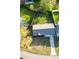 A high angle view of a brick house showing the roof and the backyard at 132 Heather Dr, Summerville, SC 29486