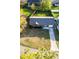 A high angle view of a brick house showing the roof and the backyard at 132 Heather Dr, Summerville, SC 29486