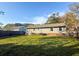 Large backyard with a well-maintained lawn and mature trees at 132 Heather Dr, Summerville, SC 29486