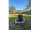 Backyard with decorative fire pit and grassy lawn at 132 Heather Dr, Summerville, SC 29486