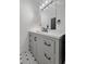 A well-lit bathroom boasts a vanity with lots of storage and drawers at 132 Heather Dr, Summerville, SC 29486