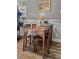 Comfortable dining room with wood dining table and matching chairs, perfect for Gathering meals at 132 Heather Dr, Summerville, SC 29486