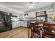 Bright kitchen with stainless steel appliances, granite countertops, and light wood floors at 132 Heather Dr, Summerville, SC 29486