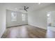 Spacious bedroom featuring hardwood floors, a ceiling fan, and lots of natural light at 136 Mitch Ln, Holly Hill, SC 29059