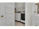 Laundry room features washer, dryer and shelving at 1362 Kingsford Ln, Mount Pleasant, SC 29466