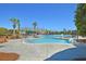 Beautiful swimming pool area with palm trees, building and inviting blue water at 1362 Kingsford Ln, Mount Pleasant, SC 29466