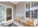 Outdoor porch featuring stylish furniture, perfect for enjoying the outdoors, while offering a relaxing spot to unwind at 1362 Kingsford Ln, Mount Pleasant, SC 29466