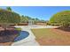 Splash pad with lush landscaping, offering a fun water play area at 1362 Kingsford Ln, Mount Pleasant, SC 29466