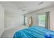 Spacious bedroom featuring a large window and plush carpeting offers a serene retreat at 140 Wampee Curve, Summerville, SC 29485