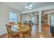 Dining room view showing the living room with a fireplace at 140 Wampee Curve, Summerville, SC 29485