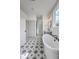 Beautiful bathroom with a freestanding tub, glass shower, and patterned tile floor at 153 Mitch Ln, Holly Hill, SC 29059