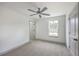This bedroom features soft carpet, a bright window, and a convenient closet for comfortable living at 153 Mitch Ln, Holly Hill, SC 29059