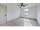 This bedroom boasts neutral carpet, a well-lit window, and a closet for comfortable, simple living at 153 Mitch Ln, Holly Hill, SC 29059