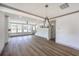 Open-concept living room boasting hardwood floors, recessed lighting, and a view of the staircase at 153 Mitch Ln, Holly Hill, SC 29059
