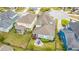 Aerial view of a home with a well-maintained backyard, patio, and screened in porch at 1543 Watoga Way, Mount Pleasant, SC 29466