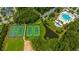 Aerial view of community tennis courts, pond, and swimming pool at 1543 Watoga Way, Mount Pleasant, SC 29466