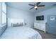 This bedroom has a ceiling fan, white windows with shutters, and white furniture at 1543 Watoga Way, Mount Pleasant, SC 29466