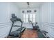 Home gym equipped with a treadmill, stationary bike, and rowing machine, offering a convenient fitness space at 1543 Watoga Way, Mount Pleasant, SC 29466