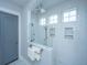 Modern walk-in shower featuring beautiful tile, shower niche, and a glass enclosure at 1543 Watoga Way, Mount Pleasant, SC 29466