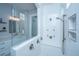 Walk-in shower features a glass divider, shower-head, body sprayers, and mosaic tile at 1543 Watoga Way, Mount Pleasant, SC 29466
