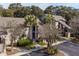 Aerial view of the property showcasing well-maintained landscaping and ample parking at 157 High Hammock Villas, Seabrook Island, SC 29455