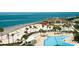 Beautiful beach with pristine sands, palm trees, swimming pool and a beachfront clubhouse at 157 High Hammock Villas, Seabrook Island, SC 29455
