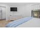 Spacious bedroom with a comfortable bed, dresser and mounted TV at 157 High Hammock Villas, Seabrook Island, SC 29455