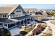 Charming clubhouse exterior with outdoor patio seating, lush landscaping, and beautiful architectural details at 157 High Hammock Villas, Seabrook Island, SC 29455