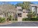 Inviting condo with palm trees and beautiful landscaping at 157 High Hammock Villas, Seabrook Island, SC 29455