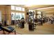 Bright community gym with lots of workout equipment, great light, and views of the water at 157 High Hammock Villas, Seabrook Island, SC 29455