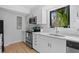 Bright, modern kitchen with stainless steel appliances and view from window at 157 High Hammock Villas, Seabrook Island, SC 29455