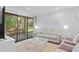 Comfortable living room featuring a plush sofa and sliding doors at 157 High Hammock Villas, Seabrook Island, SC 29455